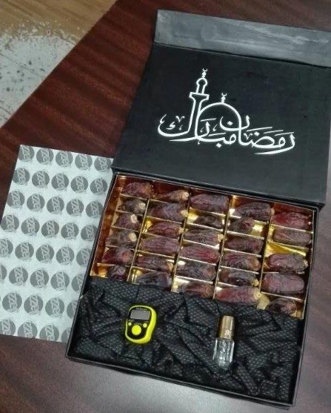 Ramadan Mubarak gift box with dates, prayer beads and attar