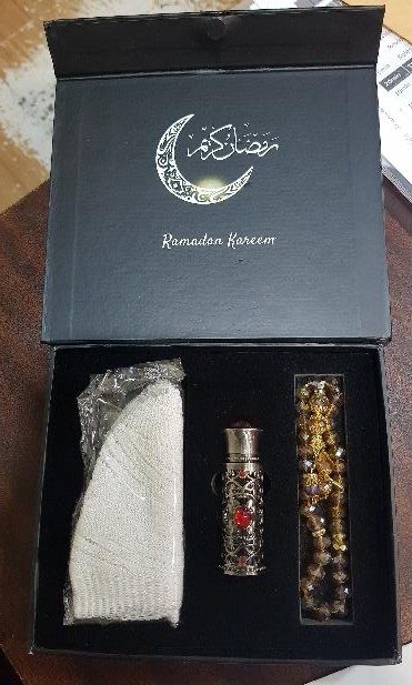 Ramadan Kareem gift box with prayer cap, attar and prayer beads